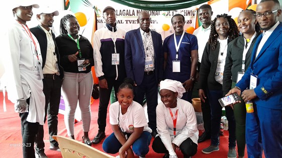 Innovation team poses for a photo with the Principal Mr. Evans Bosire during the event.